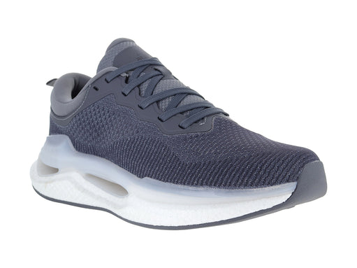 Tenis deportivos de color gris con suela blanca y tejido transpirable de malla.