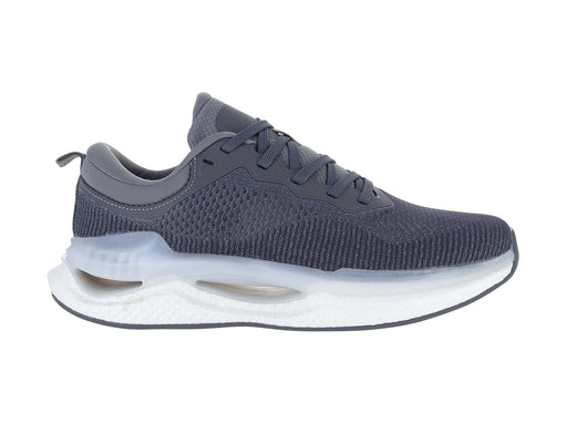 Tenis deportivos de color gris con suela blanca y tejido transpirable de malla.