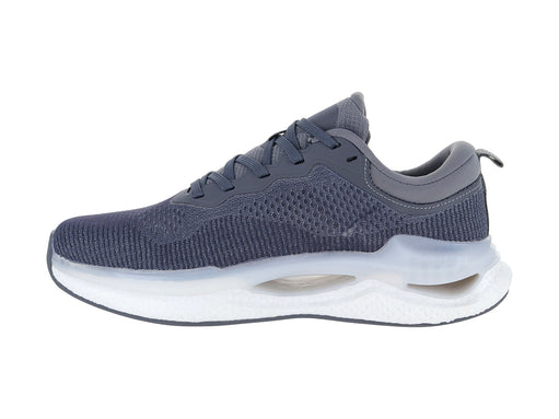 Tenis deportivos de color gris con suela blanca y tejido transpirable de malla.